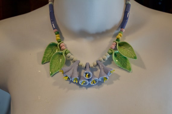 Parrot pearls ceramic best sale jewelry