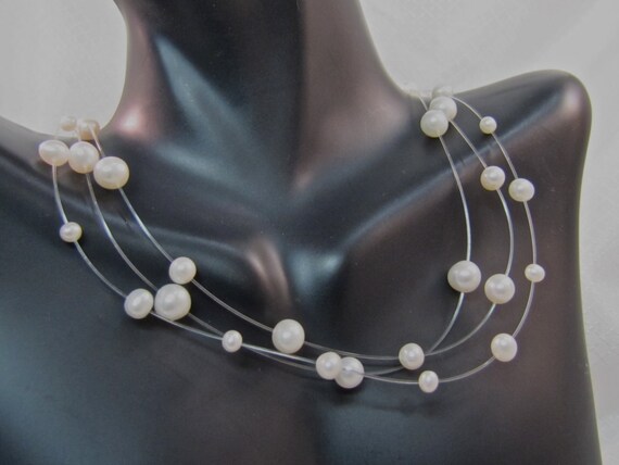 Invisible pearl necklace sale