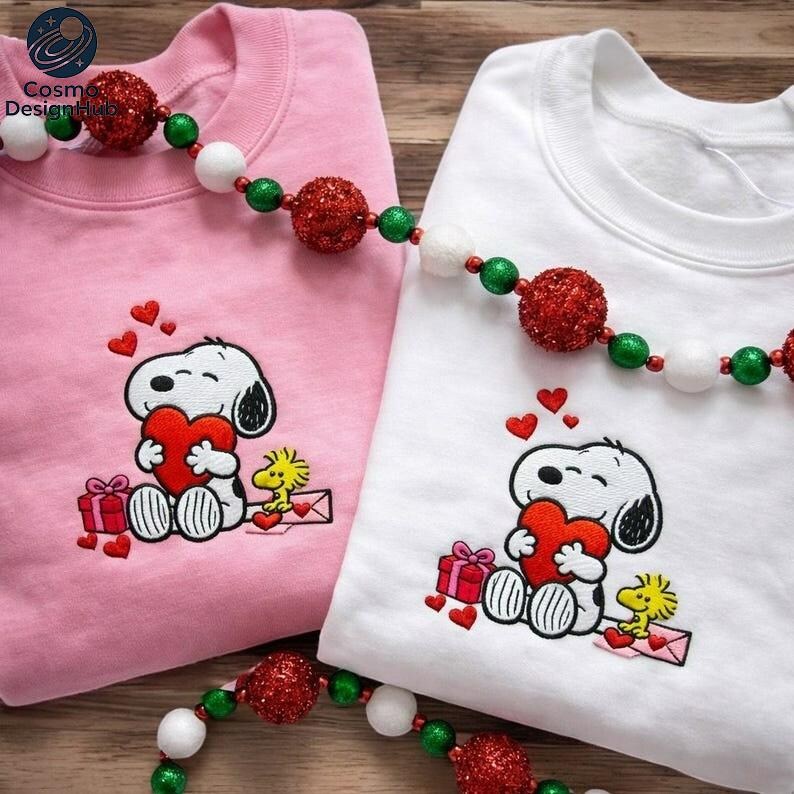 two t-shirts with a Snoopy character and a heart motif, along with a beaded necklace and red and white ornaments.
