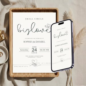 May include: A wedding invitation with the words "biglove" in elegant script, displayed on a wooden tray and a smartphone. The invitation includes the names Sophia & Daniel, the date, and time. A gold wax seal and rings are also visible.