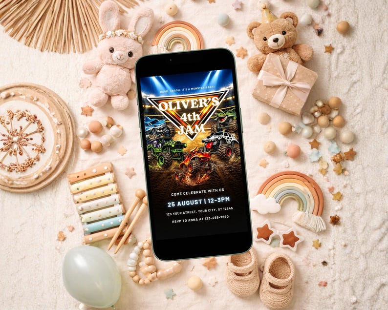 May include: A smartphone displays a birthday party invitation with the text "Oliver's 4th Jam". The invitation features monster trucks and event details. The image is surrounded by toys, including a plush bunny, teddy bear, and rainbow decor.