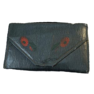 Cartera de mano con asa superior estilo art déco vintage de los años 30 en cuero azul con diseño floral