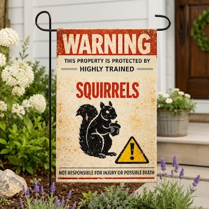 May include: A rectangular garden flag with the text "WARNING" in red, above "THIS PROPERTY IS PROTECTED BY HIGHLY TRAINED SQUIRRELS". A black squirrel illustration holding a nut is below the text. A yellow triangle with an exclamation point is at the bottom.