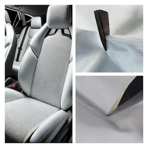 May include: A light gray car seat with a textured center panel and white leather accents. The seat has a headrest and a seat back. Additional images show a knife cutting into a light gray fabric.