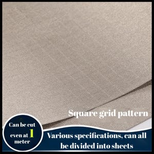 May include: Close-up of a beige fabric with a square grid pattern. The text on the image says "Can be cut even at 1 meter" and "Various specifications, can all be divided into sheets."