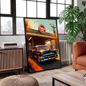 May include: A framed art print depicting a vintage black car at a retro gas station with the text "Retro Oil". The artwork features warm orange and brown tones, with a classic car and gas pumps.