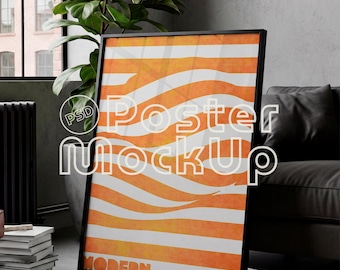 May include: A framed poster with an abstract design of orange and white horizontal stripes. The poster has the words "Poster Mockup", "Modern", and "1968" printed on it. The poster is leaning against a wall.