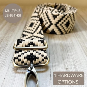 May include: A woven bag strap featuring a repeating black and cream diamond pattern. The strap includes metallic hardware with a swivel clasp and an adjustable slider. Text on the image states MULTIPLE LENGTHS and 4 HARDWARE OPTIONS.