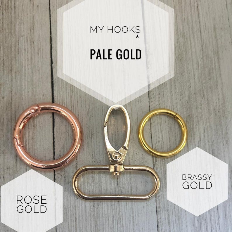 May include: A set of metal hardware including a rose gold circular spring ring, a pale gold swivel lobster clasp with an oval base, and a brassy gold circular ring. The image includes text labels reading MY HOOKS, PALE GOLD, ROSE GOLD, and BRASSY GOLD.