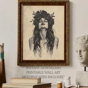 May include: A framed wall art print featuring a black ink illustration of a person with long hair and a crown of roses, looking upward. The text below reads: INSTANT DOWNLOAD, PRINTABLE WALL ART, MULTIPLE SIZES INCLUDED. The frame is dark brown wood.
