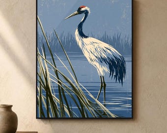 May include: A framed wall art print featuring a red-crowned crane standing in blue water among tall green reeds. The text INSTANT DOWNLOAD PRINTABLE WALL ART is displayed above the illustration, which has a distressed, textured appearance.