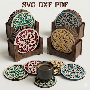 May include: Wooden coasters with intricate floral designs in teal, burgundy, and yellow, displayed in matching wooden holders. The coasters are round, with a laser-cut pattern. A cup of coffee sits on a coaster.