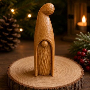 May include: A hand-carved wooden figurine of a gnome with a tall, smooth, rounded hat and a textured, vertical-grain beard. The light brown wood features visible chisel marks throughout the surface, creating a rustic, tactile appearance.