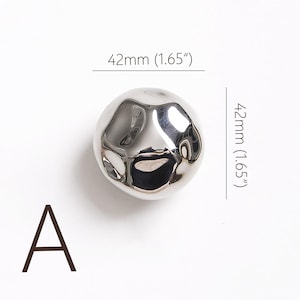 May include: A trio of ceramic mugs with a speckled, matte finish in light blue, cream, and grey. The mugs have a simple, modern design and a comfortable handle. Ideal for tea or coffee.