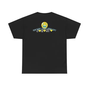 May include: Black t-shirt with a graphic design on the back. The design includes a yellow emoji with a blue outline, the text "YOU HAVE THREE LIVES LEFT", and the letters J, K, and RT, each followed by a yellow heart.