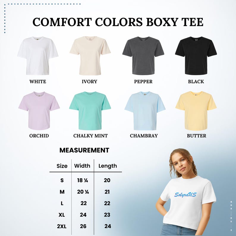 May include: A display of Comfort Colors Boxy Tees in various colors: white, ivory, pepper, black, orchid, chalky mint, chambray, and butter. The image includes a size chart with measurements in inches and a woman wearing a white tee.