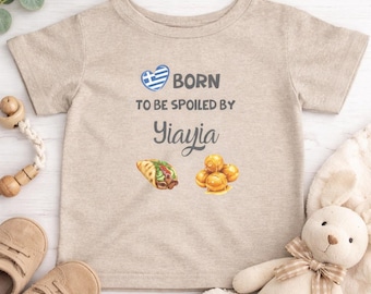 Divertida camiseta griega para bebé: Nacido para ser mimado por la abuela.