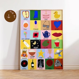 Puede incluir: Una obra de arte enmarcada con una cuadrícula de cuadrados coloridos, cada uno con una palabra e ilustración correspondiente. Las imágenes incluyen una manzana, bota, pastel, pato, huevo, dedo, gafas, corazón, helado, mermelada, tetera, labios, leche, noche, aceituna, palomitas de maíz, reina, arroz, estrella, trofeo, OVNI, vinilo, vino, rayos X, hilo y cebra.