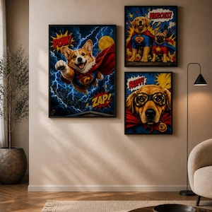 May include: Three framed wall art prints featuring comic book style illustrations of dogs as superheroes. One print shows a flying Corgi with the text POW and ZAP. Another shows two dogs with the text HEROES. The third shows a dog with the text RUFF.