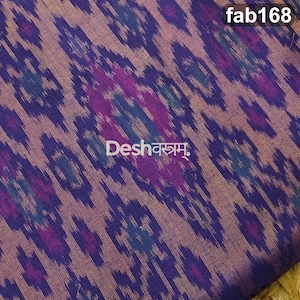 May include: A woven fabric featuring a repeating ikat pattern in shades of deep purple, magenta, and teal against a muted brown background. The text fab168 appears in the top right corner, and the text Deshवस्त्रम् is centered on the fabric.