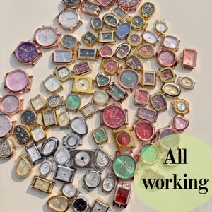 May include: A large collection of assorted wristwatches in various shapes, sizes, and colors, including round, square, heart-shaped, and oval cases with metallic, gold-tone, and silver-tone finishes. The text "All working" is visible.
