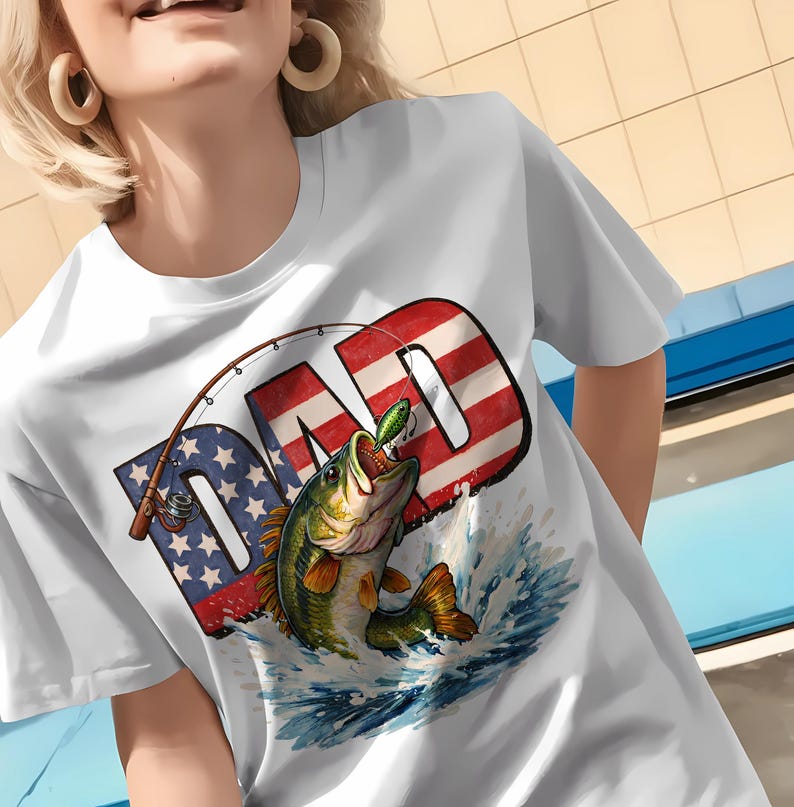 White t-shirt mockup featuring a patriotic bass fishing dad sublimation design with American flag lettering and a jumping bass fish, ideal for Father's Day and 4th of July fishing apparel