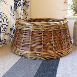 May include: A set of three ceramic mugs with a speckled, matte finish. The mugs are in cream, light grey, and dark grey. Each mug has a simple, minimalist design, ideal for coffee or tea.