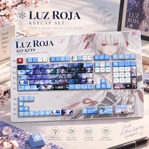 May include: A Luz Roja keycap set featuring 122 keys with anime-style character illustrations in shades of blue, white, and dark purple. The set includes a full keyboard layout with custom printed keys, additional keys, and text labels.