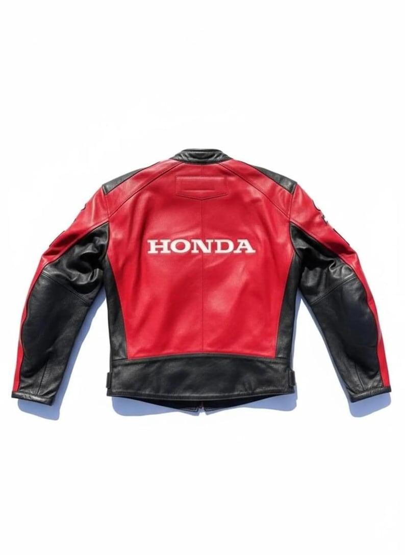 May include: Red and black leather motorcycle jacket with the Honda logo in white on the back. The jacket has black sleeves and accents, with a red body. A classic design for motorcycle enthusiasts.
