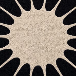 May include: A circular rug featuring a textured cream-colored center with radiating, petal-like extensions that reach outward. The background between these cream-colored extensions is a solid, deep black, creating a high-contrast sunburst pattern.
