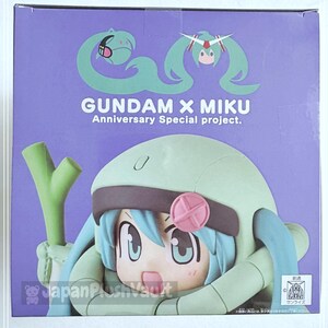 May include: A box featuring a Gundam X Miku figure. The figure has a light green helmet and blue hair. The box is purple with the text "GUNDAM X MIKU Anniversary Special project."