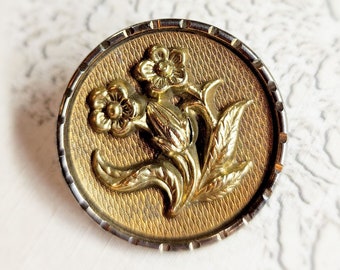 Nice Antique Flower Picture Button ~ Stamped Brass Escutcheon over Textured Metal Background ~ 1-1/8" 29mm