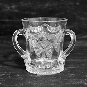Three Handled Loving Cup. Antique Pressed Glass 3-Handled Loving Cup with Swag Drape and Floral Design. Collectible Glass Loving Cup. image 1