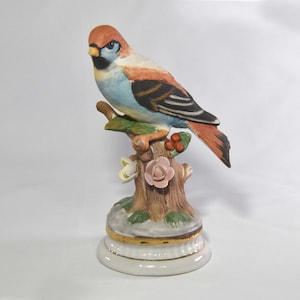 Bisque Porcelain Bird Figurine Sitting on a Stump with Flowers Made in Taiwan with Glazed Pedestal. Brown and Blue Bird Figurine.