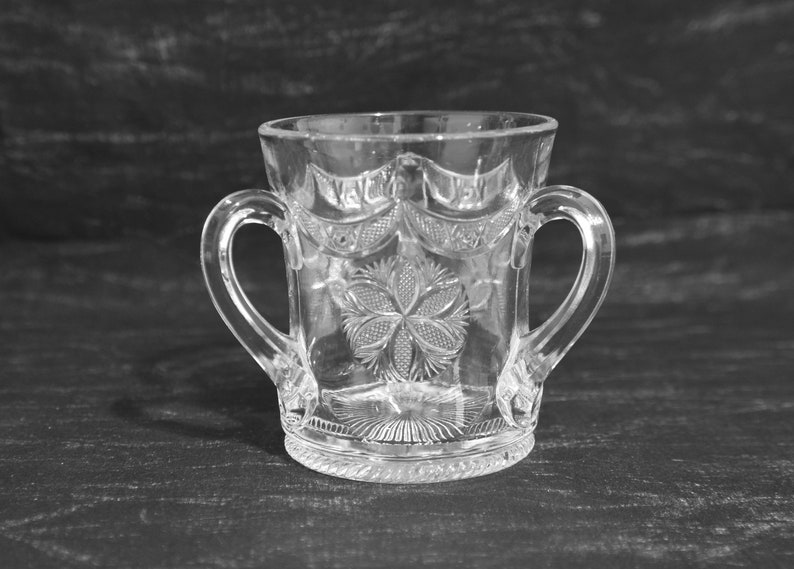 Three Handled Loving Cup. Antique Pressed Glass 3-Handled Loving Cup with Swag Drape and Floral Design. Collectible Glass Loving Cup. image 7