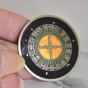 Vintage Roulette Wheel Lapel Pin. Lucky Orange and Green Roulette Wheel Pin. MAFCO Casino Roulette Lapel Pin.