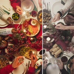 May include: Overhead view of a festive holiday table setting with various dishes, including roasted turkey, vegetables, and appetizers. People are gathered around, holding sparklers, creating a celebratory atmosphere. The table is decorated with red and green accents.