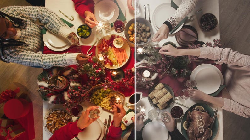 May include: Overhead view of a festive holiday table setting with various dishes, including roasted turkey, vegetables, and appetizers. People are gathered around, holding sparklers, creating a celebratory atmosphere. The table is decorated with red and green accents.
