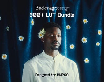 May include: A person wearing a white shirt with a high collar, adorned with flowers in their hair, stands before a dark blue curtain decorated with white daisies. The image features text that reads "Blackmagicdesign 300+ LUT Bundle" and "Designed for BMPCC."