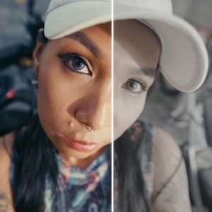 May include: A split-screen portrait of a person wearing a white baseball cap, with one side in colour and the other in grayscale. The person has dark hair, a nose ring, and visible tattoos.