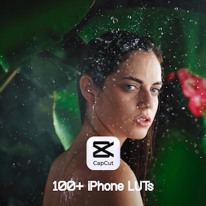 Pode incluir: Uma mulher com gotas de água no rosto e cabelo, rodeada por folhagem verde exuberante e flores vermelhas. O logotipo CapCut é visível, juntamente com o texto "100+ iPhone LUTs".
