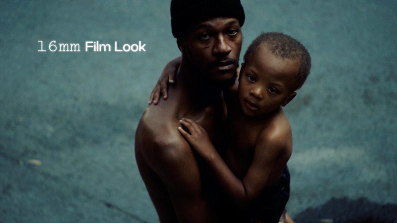 May include: A man in a black beanie embraces a child, both with dark skin. The image has a muted colour palette with the text "16mm Film Look" in the upper left corner. The background is a textured teal colour.
