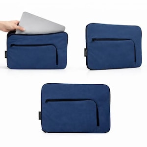 May include: A rectangular blue laptop sleeve featuring a zippered front pocket and a black side tag. The sleeve is shown in three views, including one with a silver laptop partially inserted into the main compartment, highlighting the design.