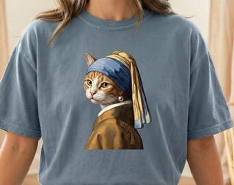 Camiseta de la serie "La joven de la perla: Gato" en colores cómodos para amantes de la historia del arte.