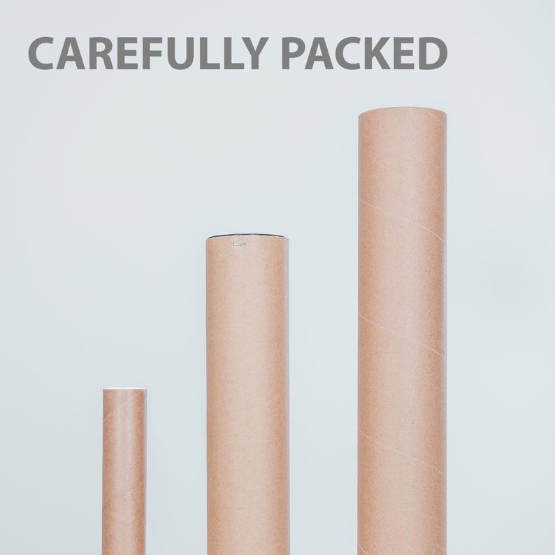 May include: Three cylindrical cardboard tubes of varying heights, arranged vertically against a white background. The tubes are a light brown color. The text "CAREFULLY PACKED" is printed in gray at the top of the image.