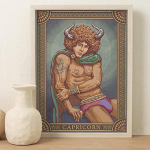 May include: A framed print featuring a Capricorn zodiac illustration. The artwork depicts a muscular figure with horns, wearing a cape and purple shorts. The print has a decorative border and the word "CAPRICORN" at the bottom.