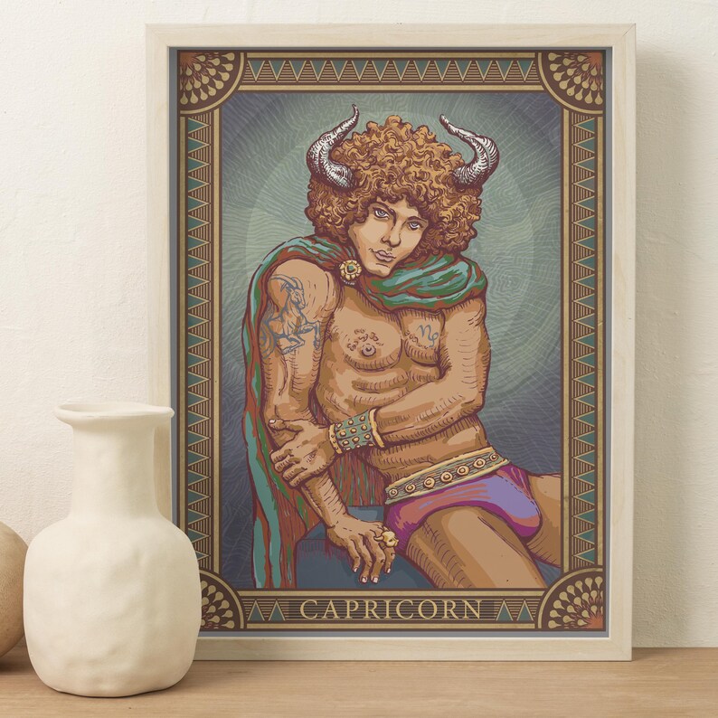 May include: A framed print featuring a Capricorn zodiac illustration. The artwork depicts a muscular figure with horns, wearing a cape and purple shorts. The print has a decorative border and the word "CAPRICORN" at the bottom.