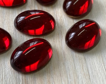 4 glass cabochons, 14x10mm, dark siam red, oval