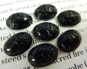 4 glass cabochons, 14x10mm, black, scarab, oval