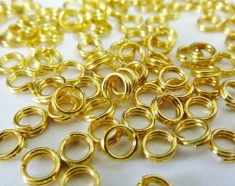 100 split rings, Ø4mm, golden